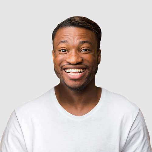 man with short hair smiling to the camera